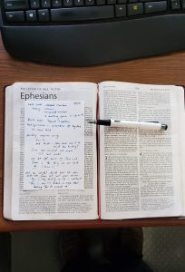 Open Bible with sermon notes