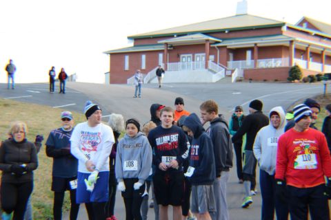 Runners line up in the cold for a 5 K Run