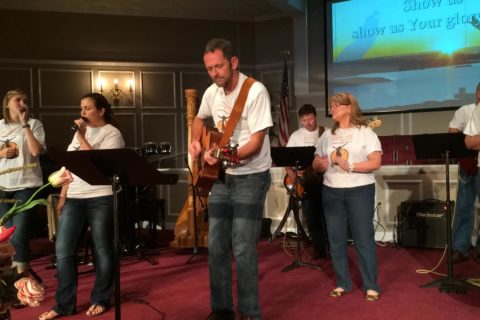 Worship band. All wearing white shirts and jeans