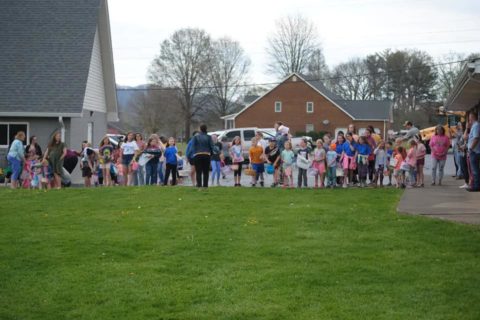 Love Chapel - Kids are lined up for an Easter egg hunt