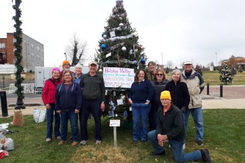 Holston Valley members and Christmas tree