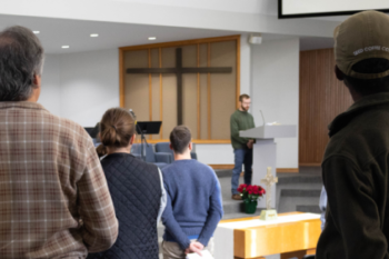 People in Foreground of Preaching